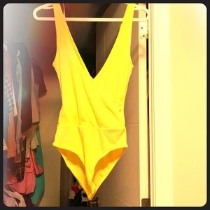 Yellow bodysuit